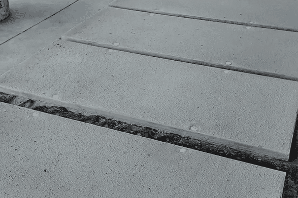 Stuccoed access panels for motorized screens and hurricane shutters are pending paint and installation.