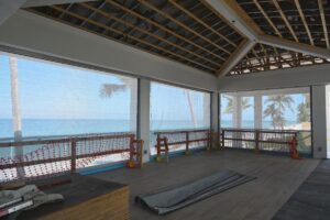 a photo of the balcony screened in