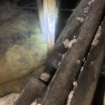 A photo of corroded refrigerant line insulation for a residential air conditioning system